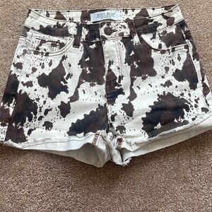 Judy, blue cow print shorts. Small never worn excellent condition.